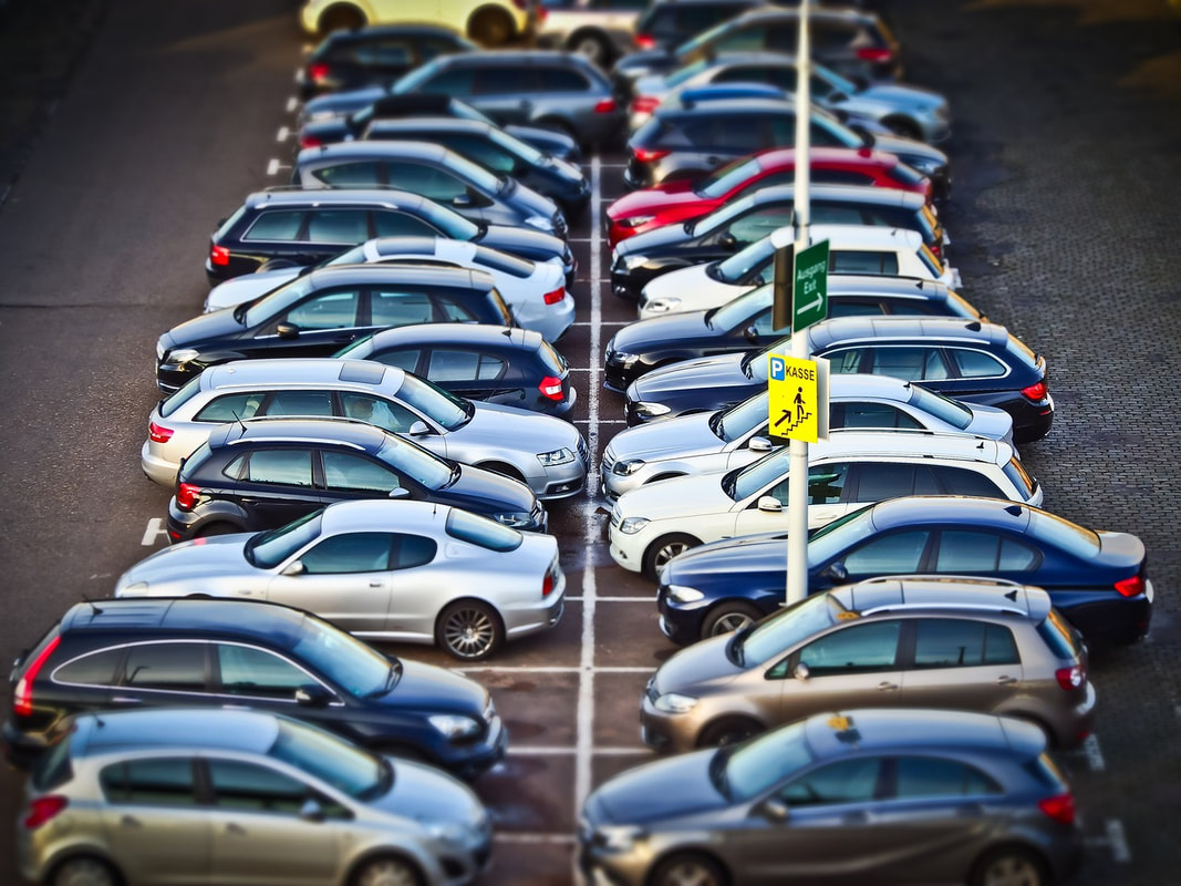 A fleet of cars parked next to each other